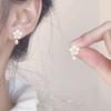 Aretes de camelia blanca perla de plata esterlina sin perforaciones nuevos de alta gama flores retro temperamento francés aretes de clip