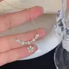 Exquisito collar de flor de circón estilo coreano, nicho de lujo ligero con un toque de alta gama, nueva y moderna cadena versátil para la clavícula, venta al por mayor