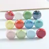 Color plateado claro con cuentas material para joyería DIY cuentas cerámicas sueltas obladas agujero recto accesorios para cadena de teléfono móvil venta al por mayor de cuentas cerámicas