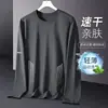 Camiseta informal de manga larga con cuello redondo, color liso, versátil, para hombre, otoño 2026, corte holgado, top moderno