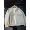 Chaqueta de retazos a rayas estilo americano con cuello alto, colección primavera/otoño para hombre, de alta gama, elegante y adecuada para parejas, top atlético de corte limpio