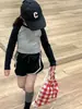 Otoño 2025 Ropa Nueva para Niños Estilo Coreano Niñas Camiseta Corta de Color de Contraste Pantalones Deportivos Cortos con Cordón Hot Pants