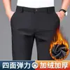Pantalones Negros Rectos Elásticos en Cuatro Direcciones Suaves de Primavera 2026 Estilo Coreano Casual Atractivo No Planchar Pantalones de Traje de Negocios Ropa Versátil para Hombre