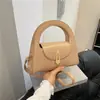 Bolsa de mão de nicho estilo coreano transfronteiriça para mulheres, novo modelo outono 2026, moda para o dia a dia, bolsa transversal de ombro vintage de alta aparência