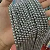 Perlas de imitación Swarovski de color gris plateado frío, cuentas redondas sueltas con agujeros rectos, perlas de concha, accesorios para joyería DIY, ventas directas de fábrica