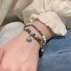 Pulsera de seguridad con piedra de ámbar vintage para mujer, pulsera de cuentas exquisita de nicho de lujo ligero, nuevo estilo chino para parejas y amigas