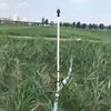 Sistema de Riego por Aspersión con Boquilla de Brazo Giratorio, Base de Inserción al Suelo de Tres Vías Giratoria de 360 Grados para Riego Agrícola y Humidificación de Campos de Trigo