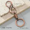 Venta al por mayor del fabricante Transfronterizo Más Vendido Modelo Nuevo Llavero para Coche Colgante de Cintura para Hombre, Pequeño Regalo Retro de Aleación Simple y Creativo
