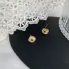 Brincos de fita enrolada com zircônia microincrustada de diamantes 2021 novo tendência personalidade temperamento all-match brincos brincos atacado