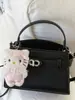 Bolso de Mano de Lujo Ligero Estilo Coreano para Mujer 2026 Primavera Nueva Moda Bolso de Hombro para el Trabajo Bolso Cruzado Elegante de Color Sólido para Mujer