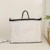Bolsa de mano textil para el hogar de PVC totalmente transparente personalizada, bolsa de almacenamiento para edredón con cremallera de cuerda tejida negra, embalaje de ropa de cama