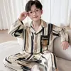 Cardigan Infantil com Gola Lapela Roupa de Casa Estilo Coreano Caimento Solto Conjunto de Algodão Puro com Desenho para Meninos Primavera e Outono 2026 Novo Pijama