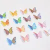 Uña tridimensional Aurora moño pequeño color transparente plateado mini mariposa de resina diamante pegatina de uña paquete de material de diamante decorativo