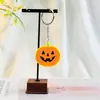 Temu los más vendidos llavero colgante DIY Halloween PVC estilo mixto aleatorio calavera de dibujos animados calabaza fantasma colgante
