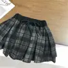 Traje para Niña Primavera y Otoño Nuevo Elegante Dibujos Animados Infantiles Tejido de Punto con Tirantes Cuello de Muñeca Capa Base Falda Media de Cuadros Comercio Exterior