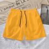 Venta al por mayor de fábrica 22 verano pantalones cortos casuales para hombre color caramelo pantalones para hombre 14 colores Comercio exterior pantalones de playa en nombre del envío
