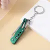 Cuchillo de fruta de acero inoxidable para camping al aire libre transfronterizo, cuchillo plegable EDC portátil para llevar en cabina, llavero, color