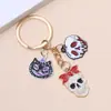 Colgantes de llavero de Halloween transfronterizos europeos y americanos fantasma calavera calabaza parca aleación bolsa de aceite goteo accesorios al por mayor