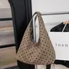 Bolso de mano con lunares texturizados minimalista transfronterizo para mujer, nuevo modelo 2026, bolso de mano/hombro de pana versátil de alta gama
