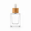 Botella Cuadrada de Aceite Esencial de Árbol de Té Creativa de Fabricante de 15 ml 30 ml Gotero de Esencia de Aromaterapia Botella de Vidrio al Mayoreo