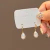Colección de Pendientes Elegantes de Perlas Estilo Coreano Aguja de Plata, Pendientes de Mariposa y Flor de Lujo Ligero de Gama Alta, Perlas de Botón Vintage