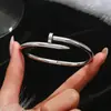 Conjunto de Pulseras de Acero Inoxidable Doradas Transfronterizas con Clavos de Diamante Pulsera de Trébol de Cuatro Hojas Cintura Pequeña Brazaletes Dorados
