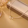 Collar de Cuentas Millet con Colgante de Unicornio de Nácar y Estrella de Cinco Puntas, Diseño Sencillo de Lujo Ligero de Nicho, Venta al por Mayor