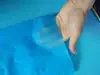 Sábanas desechables para salones de belleza, engrosadas, impermeables, a prueba de aceite, para camas de masaje con agujeros, no tejidas, transpirables, 100 hojas, al por mayor