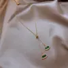 Collar de cristal con forma de abanico de esmeralda barroca para mujer, colgante de personalidad sencilla y moderna de Internet, cadena de clavícula de lujo con sensación de luz.