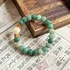 Pulseira Bodhi de laço único com design de pata de gato grelhada no carvão, contas de maçã Flying Apsaras de Dunhuang para homens e mulheres, pulseira cultural macia para envolver o dedo, atacado