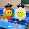Temporada de Graduación Doctor Girasol Clip Globo Mesa Flotante Margarita Escuela Jardín de Infancia Foto Ambiente Accesorios
