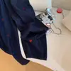 Pantalones de Mezclilla de Pierna Ancha con Estampado de Corazones de Gama Alta para Mujer Otoño 2025 Nuevos de Cintura Alta Sueltos y Cómodos Casuales Rectos