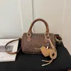 2026 Nuevo Bolso Boston con Estampado de Leopardo para Mujer Estilo Retro Diario Bolso de Mano de Nicho Bolso de Hombro Bolso Cruzado Versátil