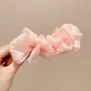 Nuevo y exquisito pasador de pelo con lazo 2026, un accesorio lujoso y de alta gama, con un diseño de pinza de plátano estilo coreano, creando un look dulce y moderno para mujeres