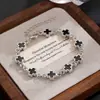 Pulsera Cruzada Negra y Blanca de Diseño Original de Moda de Nicho, Accesorio Versátil y Exquisito
