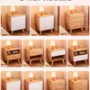 Mesita de noche de madera maciza para dormitorio del hogar 2026 Venta caliente Creativa Pequeño Armario de almacenamiento simple para niños Mesita de noche de tronco