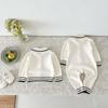 Mono de otoño coreano nuevo para bebé para niños y niñas, traje de punto estilo western para bebé para salir, abrigo con bolsa para pañales, abrigo versátil