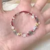2024 Nuevo Hilo Rojo Tejido de Flores Diseño Creativo Sentido Avanzado de la Vida Cuerda Roja Rica Flor Pulsera Hecha a Mano