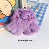 Colgante de monstruo de peluche de moda de celebridad de Internet, lindo muñeco monstruo de ojos grandes y pelo largo, broche de bolso, muñeca de máquina.