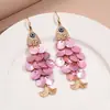 Pendientes de gancho de resina con forma de hoja ovalada y pluma, transfronterizos europeos y americanos, pendientes frescos y sencillos de verano, pendientes de diseño nicho para mujer