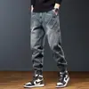 Jeans de trabajo lavados estilo retro americano para hombre, nuevos y versátiles pantalones tipo jogger holgados casual, pantalones harén para hombre, ropa de moda para hombre