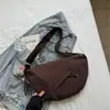 Bolsa Feminina Tendência 2026 Primavera Nova Bolsa de Lona Leve para o Trabalho Bolsa de Ombro Único Transversal Fashionable Bolsa Casual Dumpling