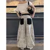 Calça larga de patchwork com estampa de leopardo, estilo casual de rua americano para mulheres, outono, caimento solto, modeladora, design de nicho, calça de perna curva da moda