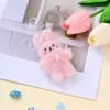 Juguete de peluche de conejo suave y esponjoso de pelo rizado con rubor, bordado y pajarita de perlas, colgante de conejo pequeño, accesorios de producto semiacabado al por mayor