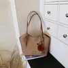 Bolsa Feminina Grande Capacidade Elegante para o Dia a Dia 2026 Outono Inicial Nova Bolsa de Ombro Único Bolsa Tote de Mão Tendência de Alto Estilo