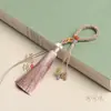 Cuerda de borla cola de fénix nudo de maíz para colgar en bolsa DIY Anillo tejido a mano Colgante de llavero Cordón Venta al por mayor