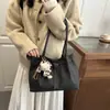 Bolso de mano de moda transfronterizo de nicho Bolso de mujer Nuevo estilo Invierno 2025 Bolso de hombro plisado con cordón Bolso de axila para el trabajo