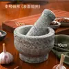 Molino pequeño para uso doméstico tú pequeño molino de piedra viejo molino de piedra viejo rural viejos objetos cultura tradicional china hecho a mano