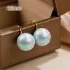 Saltos Altos Azul Fumê Brincos de Pérola para Mulheres, Temperamento de Luxo Leve, Moda de Nicho, Ganchos de Orelha de Pérola Aurora Azul Claro
