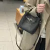 Bolso pequeño tipo cubo de piel de vaca de primera capa para mujer, Bolso de mano de alta gama para el trabajo, Bolso de hombro de piel de vaca Togo, Bolso cruzado para el trabajo